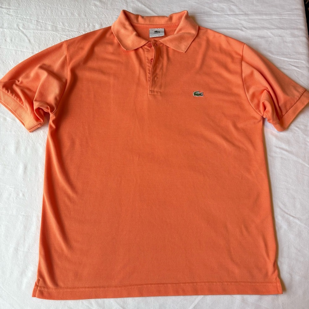 Lacoste Men's classic pique polo in a coral orange color